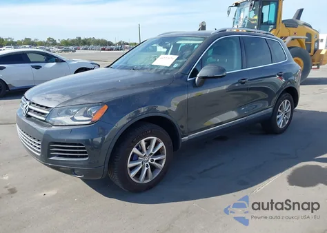 2014 Volkswagen Touareg 3.6L Sport from USA, damaged, VIN WVGEF9BP3ED006664